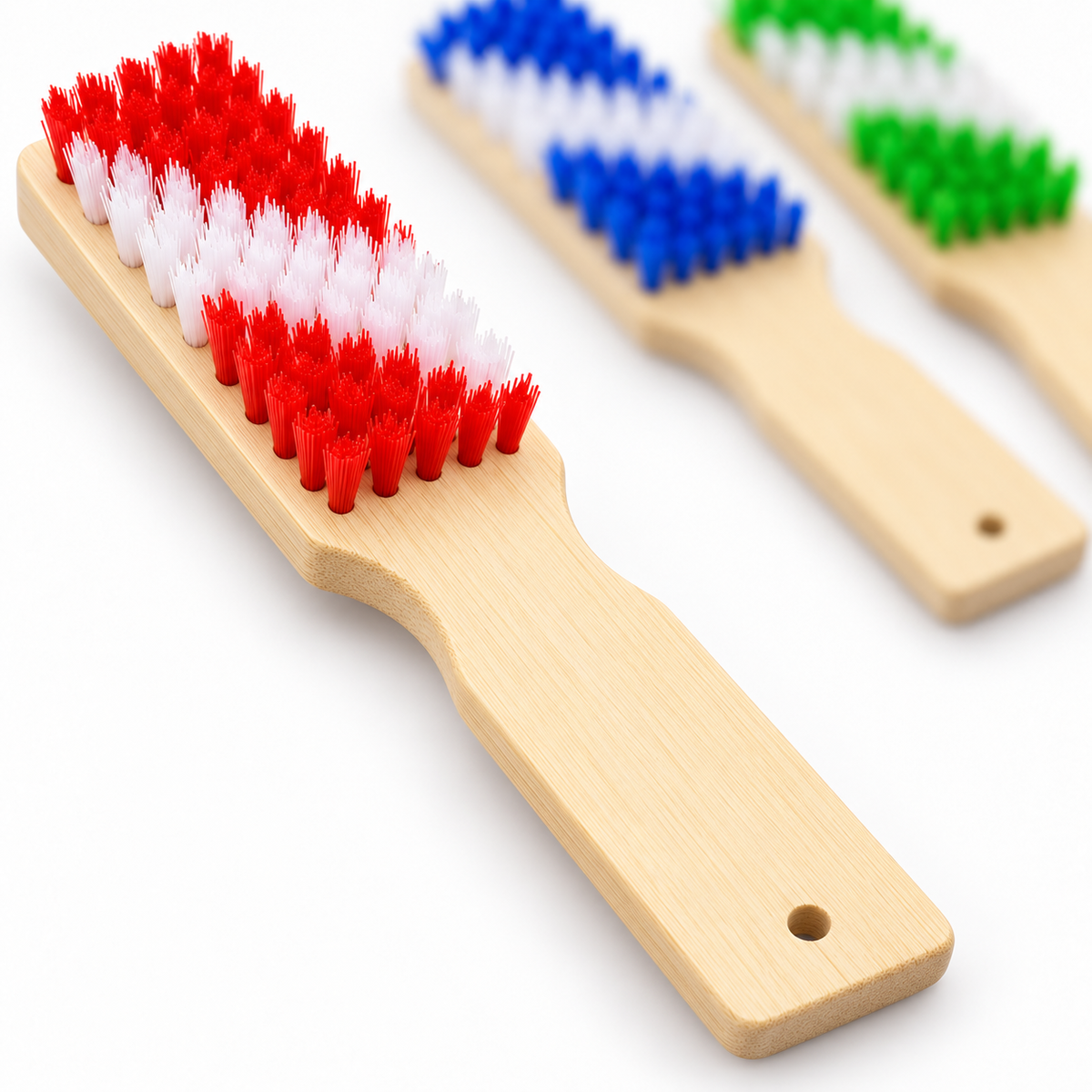 Detail of plastic bristles and a bamboo handle.